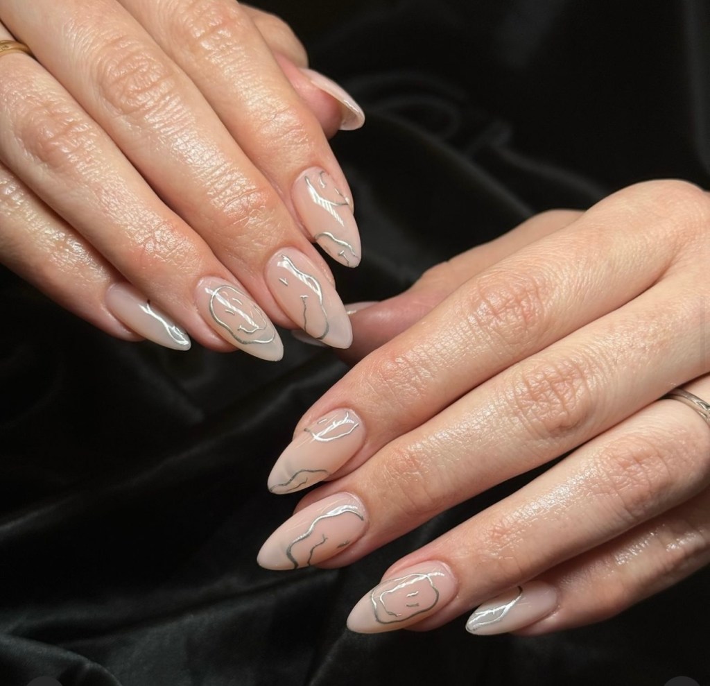 Manicured nails with art and polish